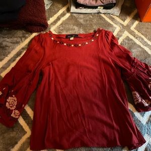 red embroidered shirt with flowey sleeves